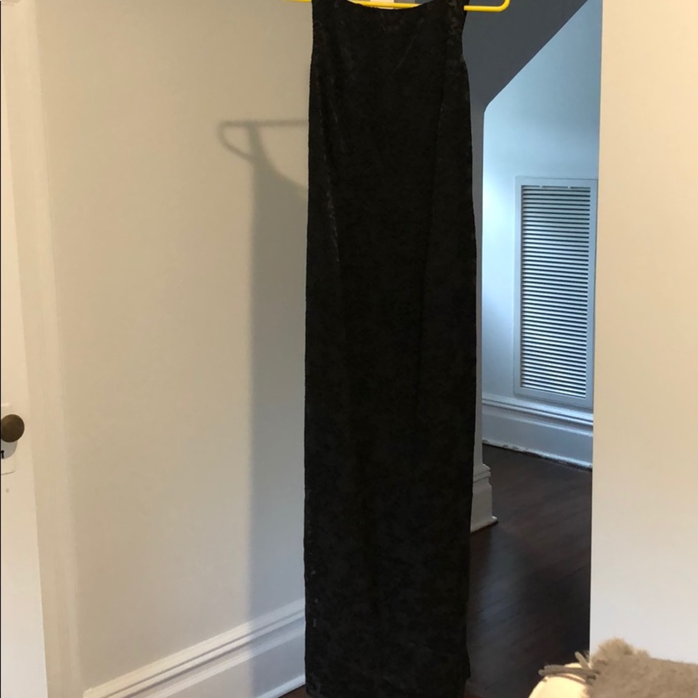 Long black evening gown with velvet floral overlay